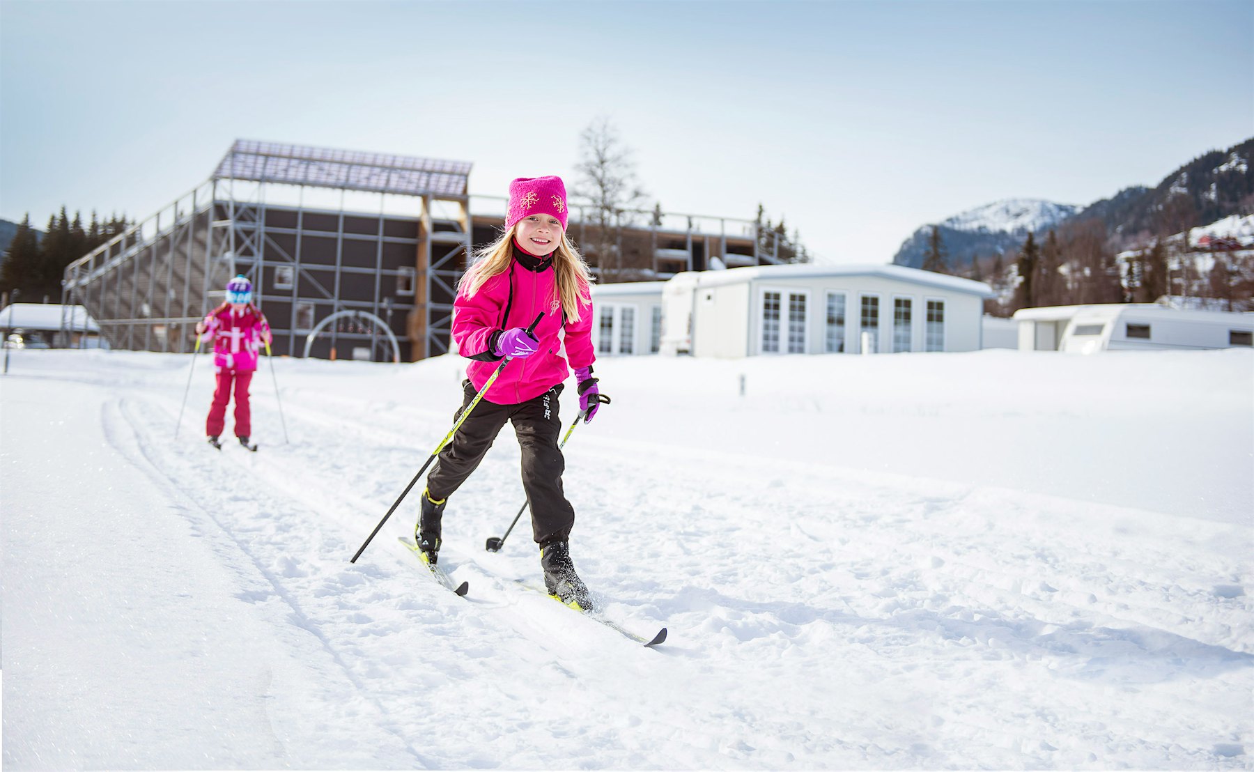 Children have fun in great winter weather on cross-country skis at Topcamp Hallingdal. Photo